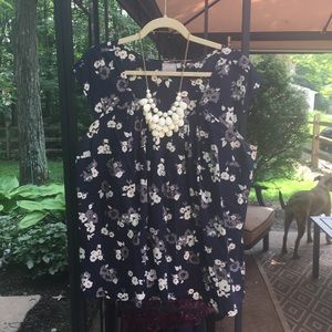 Gorgeous cotton blouse with capped sleeves.